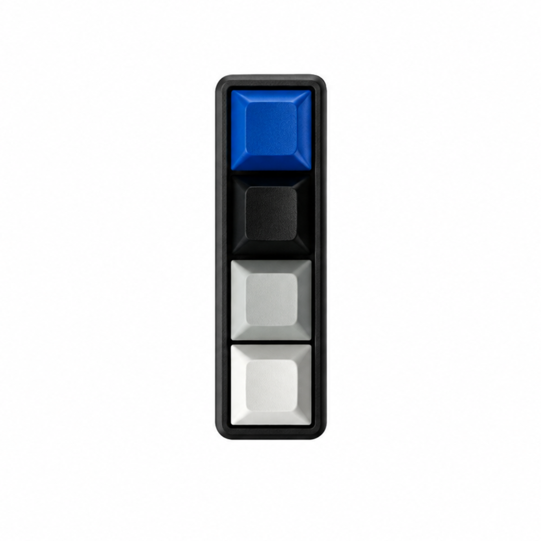The Classic 4-key bar fidget with dark blue, black, grey, and white keycaps on a black base.