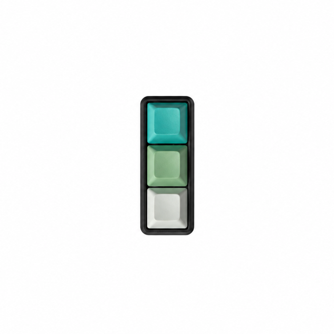 The Mini 3-key fidget in Sea Breeze, with cyan, light green, and white keycaps and a black base.