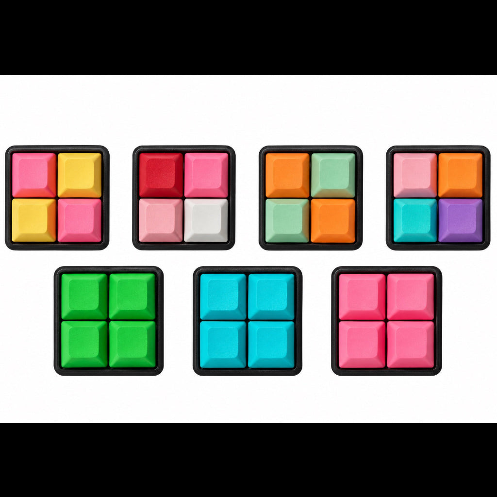 Top view of seven Pocket 4-key square keyboard fidgets with black bases in different keycap color combinations.