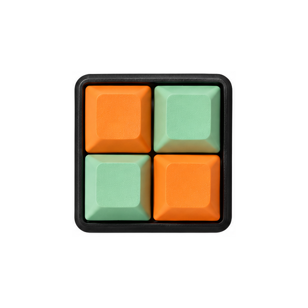 The Pocket 4-key square fidget with orange and mint green keycaps on a black base.