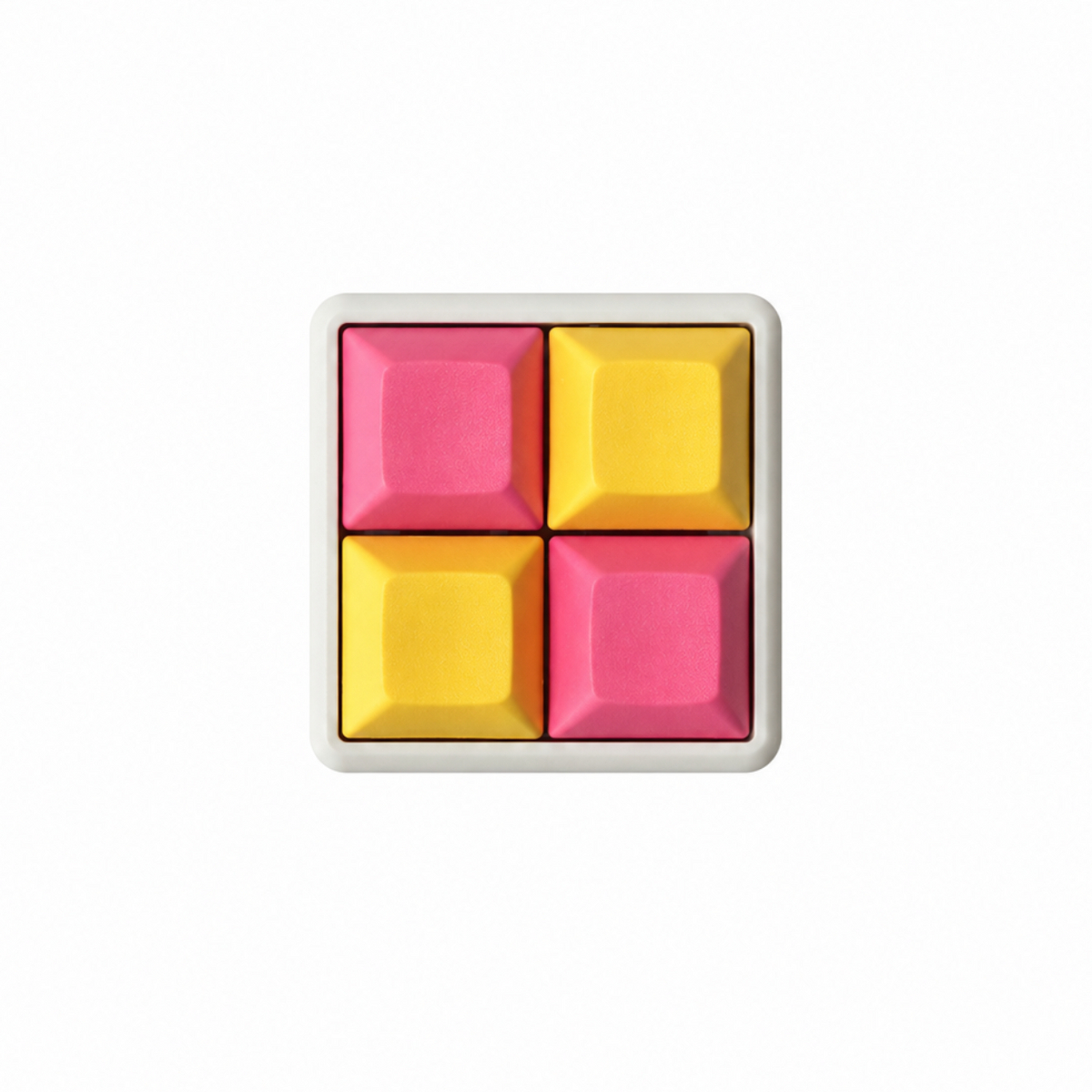 The Pocket 4-key square fidget with pink and yellow keycaps on a white base.