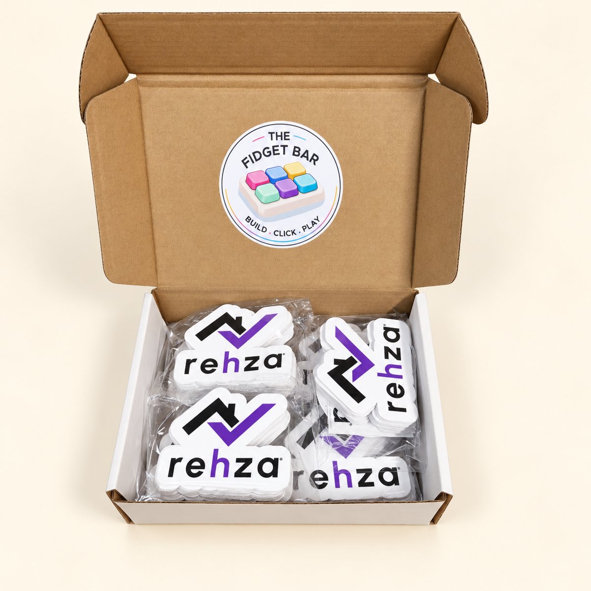 Custom corporate stickers: REHZA logo stickers, prepared as a custom business order.