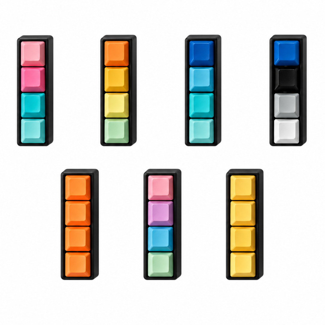 Top view of seven Classic 4-key bar keyboard fidgets with black bases in different keycap color combinations.