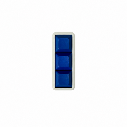 The Mini 3-key fidget with solid blue keycaps and a white base.