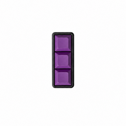 The Mini 3-key fidget with solid lavender keycaps and a black base.