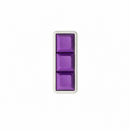 The Mini 3-key fidget with solid lavender keycaps and a white base.