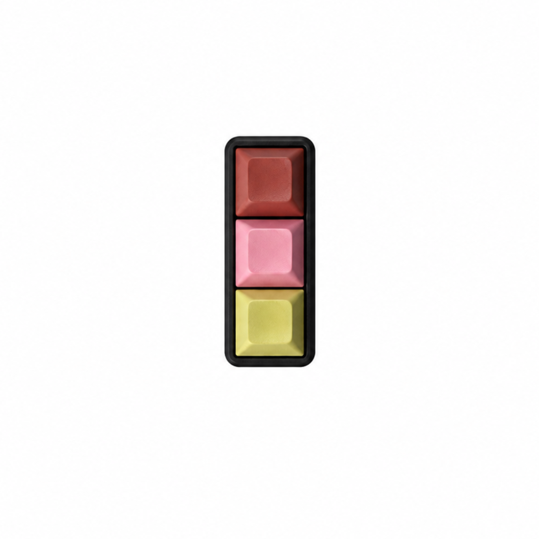 The Mini 3-key fidget in Peach Sorbet, with terracotta, pink, and light yellow keycaps and a black base.