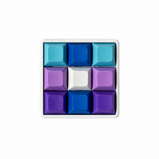 The Original 9-key square keyboard fidget in Blueberry Swirl with a white base.