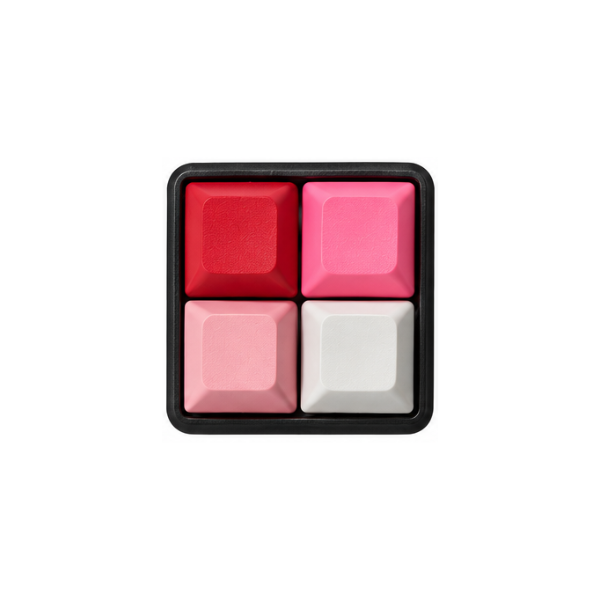 The Pocket 4-key square fidget with red, rose red, pink, and white keycaps on a black base.