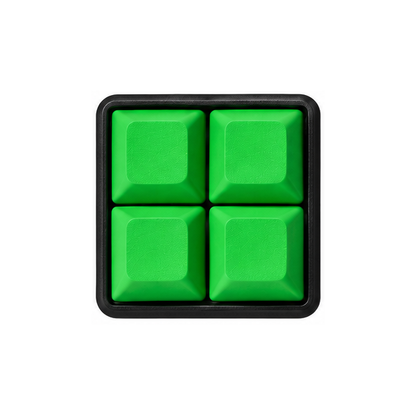 The Pocket 4-key square fidget with solid green keycaps on a black base.