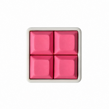 The Pocket 4-key square fidget with solid hot pink keycaps on a white base.